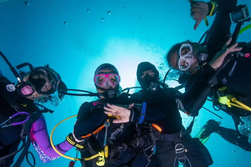 Diver near coral reef at Golden Passage dive site