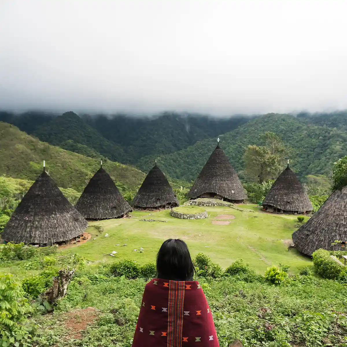 Illustrative travel image -- not a photo of an actual Wae Rebo homestay