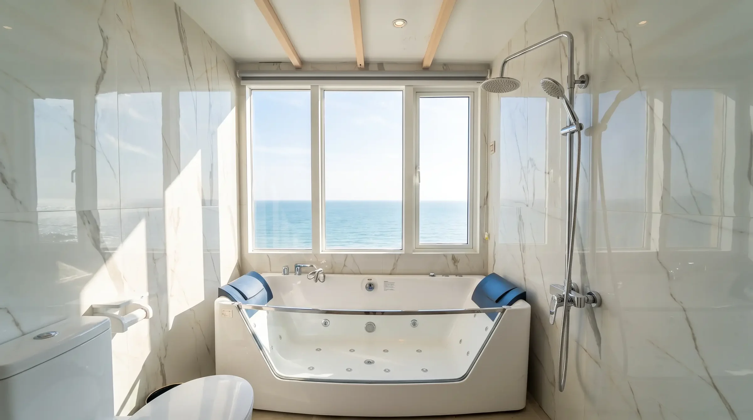 Master Suite bathroom on Lasha Phinisi Cruise with a jacuzzi tub and sea view